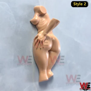 Funny Human Body Wall Hook 11 Glossy nude beige wall hook shaped like a stylized curvy human body with an arm on the hip photographed on a light blue background!