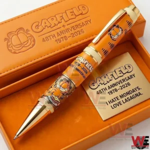 A Garfield anniversary collectible pen displayed in an orange box with character artwork and matching themed packaging!