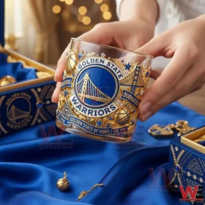 Hand holding a Golden State Warriors whisky glass with detailed design!