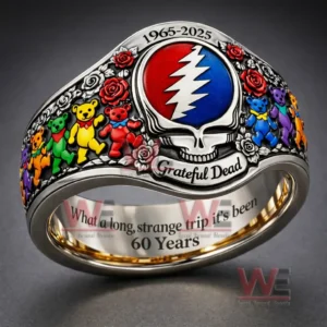 Close up of a Grateful Dead commemorative ring showing the skull and lightning emblem with roses and colorful dancing bear figures plus the 1965 to 2025 anniversary and 60 years message!