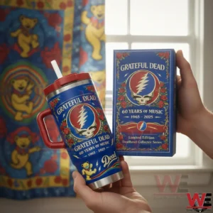 Hands holding a blue Grateful Dead tumbler with a red lid and handle next to a matching collector box featuring a skull lightning emblem and Sixty Years Of Music Nineteen Sixty Five to Two Thousand Twenty Five text.