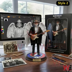 Young guitarist figurine with wings displayed on a desk with computer art software and sculpting tools!
