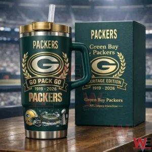 Dark green Green Bay Packers insulated travel mug with handle and straw beside a matching heritage edition gift box with a stadium background!