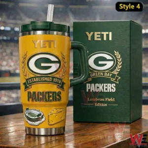 Yellow Green Bay Packers insulated tumbler with Lambeau Field edition box on a wooden surface!