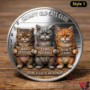 Silver toned coin on a wooden table featuring three grumpy cats holding signs that read bad attitude zero patience and dont care with grumpy old cats club text.