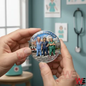 Hands holding a round nurse themed coin with three nurses in scrubs and Grumpy Old Nurse Club text in a clinic setting!