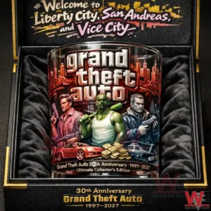 A clear whiskey glass with Grand Theft Auto character illustrations and anniversary design placed securely inside a luxury display case!