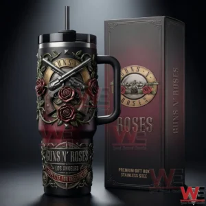 Guns N Roses tumbler with handle and straw beside a matching premium gift box featuring crossed guns red roses and ornate vintage metal artwork in a dark studio background!