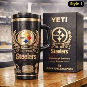 Black Pittsburgh Steelers tumbler with handle and straw featuring gold Here We Go Steelers Est 1933 crest and icons displayed on a wooden surface beside a matching Steelers gift box style one!