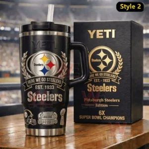 Black Pittsburgh Steelers tumbler with handle and straw featuring silver Here We Go Steelers Est 1933 crest and icons shown on a wooden surface beside a matching Steelers gift box style two!