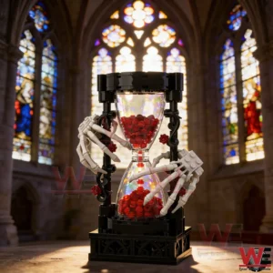Gothic black framed hourglass building block display with skeletal hands and red pieces in a cathedral with stained glass windows!
