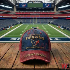 Houston Texans 24th anniversary baseball cap positioned in front of a football field inside a large stadium!