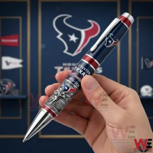 Houston Texans 50th Anniversary Commemorative Pen 3 Hand holding a navy red and silver Houston Texans anniversary pen with 50th Anniversary 1976 2026 text in front of a team themed background!