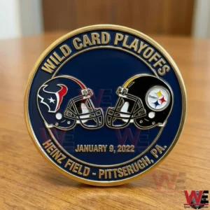 Houston Texans AFC Wild Card Victory Coin 5 Back of a wild card playoffs coin showing two football helmets facing each other with January 9 2022 text and Heinz Field Pittsburgh PA location in navy and gold