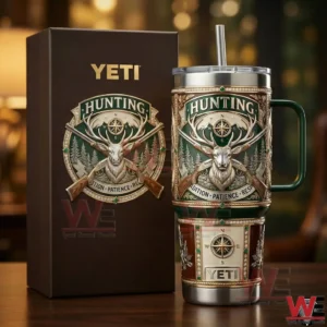 YETI hunting themed insulated tumbler with deer emblem and branded box on wooden table