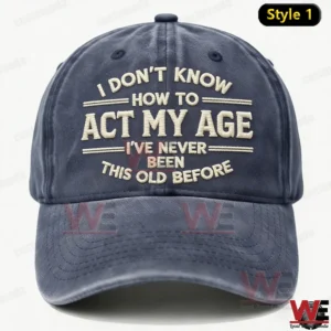 A front view of a dark blue baseball cap with embroidered humorous age related text displayed against a clean white background!