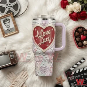 I Love Lucy themed tumbler with handle and straw featuring a heart design placed on white fur with vintage film and Hollywood accessories!