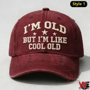Front view of a burgundy baseball cap featuring bold embroidered lettering and star details on the crown!