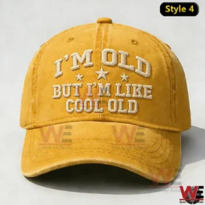 Front view of a mustard yellow baseball cap with bold embroidered lettering and decorative stars!