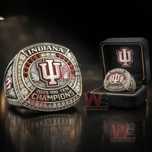 Indiana Big Ten Champions ring with IU logo gemstone border engraved year and champions text displayed with a branded box on a dark background