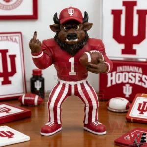 An Indiana Hoosiers mascot figurine with a football is displayed on a tabletop surrounded by team themed items!