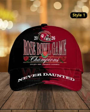 Two tone red and black Indiana Hoosiers cap with Rose Bowl Game Champions embroidery rose details year two thousand twenty six and Never Daunted text on the brim displayed on a wooden table!