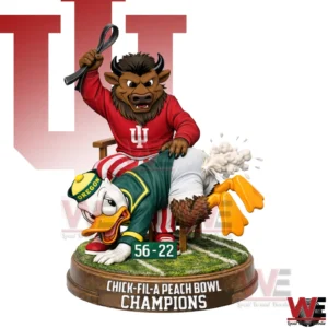 A detailed statue of a bull mascot in red sitting confidently over a duck mascot on a round grass base with a strong athletic theme!