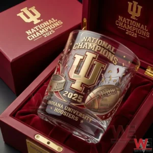 Indiana University 2025 national champions whiskey glass resting inside a velvet lined gift box with refined collegiate design!