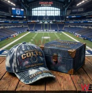 Indianapolis Colts 73rd ANniversary Casual Cap hat 3 An Indianapolis Colts anniversary cap and matching keepsake box displayed on a wooden table with a football field and stadium seating in the background!