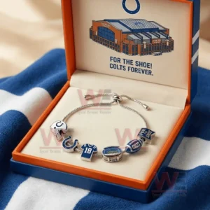 Gift boxed Indianapolis Colts themed adjustable charm bracelet with helmet horseshoe jersey stadium football and For The Shoe charms inside a blue and orange box.