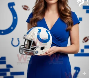 A person wearing a blue outfit displays a brick built Colts football helmet with team colors and logo clearly visible!