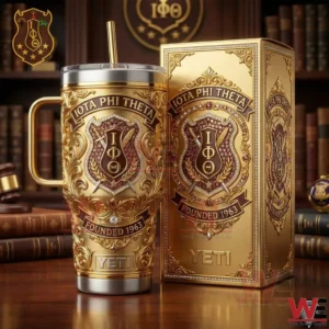 A Yeti tumbler and presentation box showcasing Iota Phi Theta founded nineteen sixty three artwork arranged in a classic library environment!