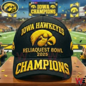 Front facing Iowa Hawkeyes Champions cap with gold embroidery and hawk logo photographed with a stadium celebration scene and falling confetti!