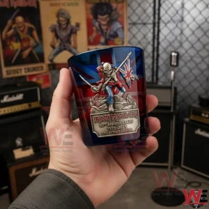 Iron Maiden 50th Anniversary 1975-2025 Metal Legends Whiskey Glass 3 Hand holding an Iron Maiden fiftieth anniversary whiskey glass with band artwork in a music studio setting!