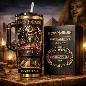 Black and gold insulated tumbler with handle and straw featuring Iron Maiden Powerslave era pharaoh skull design beside a matching collector box with pyramids statues and firelight in the background!