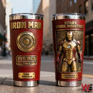 Two Iron Man insulated tumblers with red textured exterior gold lettering anniversary tribute arc reactor emblem and a three dimensional armored hero design displayed in an urban setting!