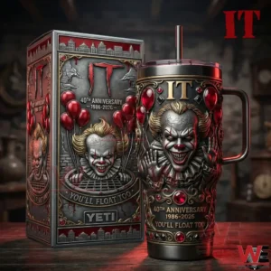 A horror themed insulated tumbler and collector box with a sculpted clown face red balloon accents and forty year anniversary design displayed on a dark tabletop!