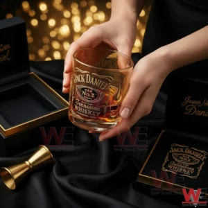 Hands holding a Jack Daniels whisky glass with amber whiskey!