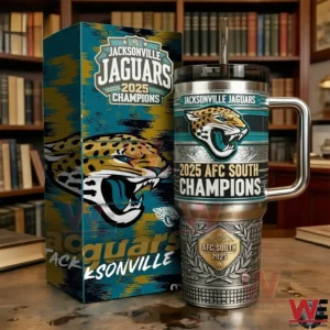 Jacksonville Jaguars 2025 AFC South Champions Tumbler 5 Jacksonville Jaguars themed 2025 AFC South Champions stainless steel tumbler with handle and straw displayed next to a matching champions gift box on a table in front of bookshelves in a library style room!