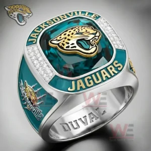 Close up of a Jacksonville Jaguars ring with teal gemstone top jaguar logo Jacksonville Jaguars lettering sparkling border and Duval engraving inside the band!