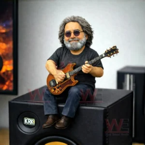 Musician figurine with gray hair and beard wearing sunglasses sitting on a studio speaker and playing a brown electric guitar in a music studio setting!