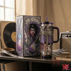 Jimi Hendrix themed tumbler with guitar artwork handle clear lid and straw displayed beside a matching collector box on a music table!
