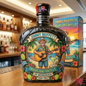 A Crown Royal bottle with a vibrant Margaritaville themed label showing Jimmy Buffett playing guitar surrounded by tropical imagery on a bar counter!
