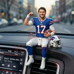Miniature football player in a blue number seventeen jersey sitting on a car dashboard holding a football with a helmet beside him and city street background