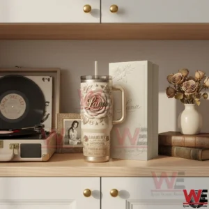 Lana Del Rey themed tumbler with handle and straw displayed on a shelf beside its box with vintage decor and music inspired elements!
