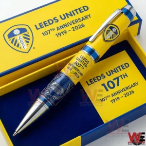 Leeds United anniversary pen set in a yellow and blue presentation box with 107th anniversary text and club themed styling.