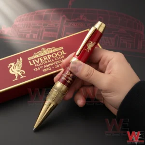 Liverpool Football Club 134th Anniversary 1892-2026 Pen 3 Hand holding a Liverpool Football Club anniversary collectible pen with red and gold design and detailed commemorative artwork!
