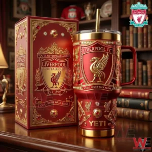 Liverpool Football Club insulated tumbler with handle and straw displayed next to a matching red and gold box on a wooden table!