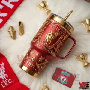 Liverpool You'll Never Walk Alone Yeti 40oz Tumbler 5 Liverpool Football Club insulated tumbler with handle and straw displayed on a decorative surface with football themed items!
