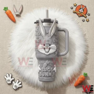 Bugs Bunny themed tumbler with handle and straw featuring a raised bunny face placed on a white fur background!